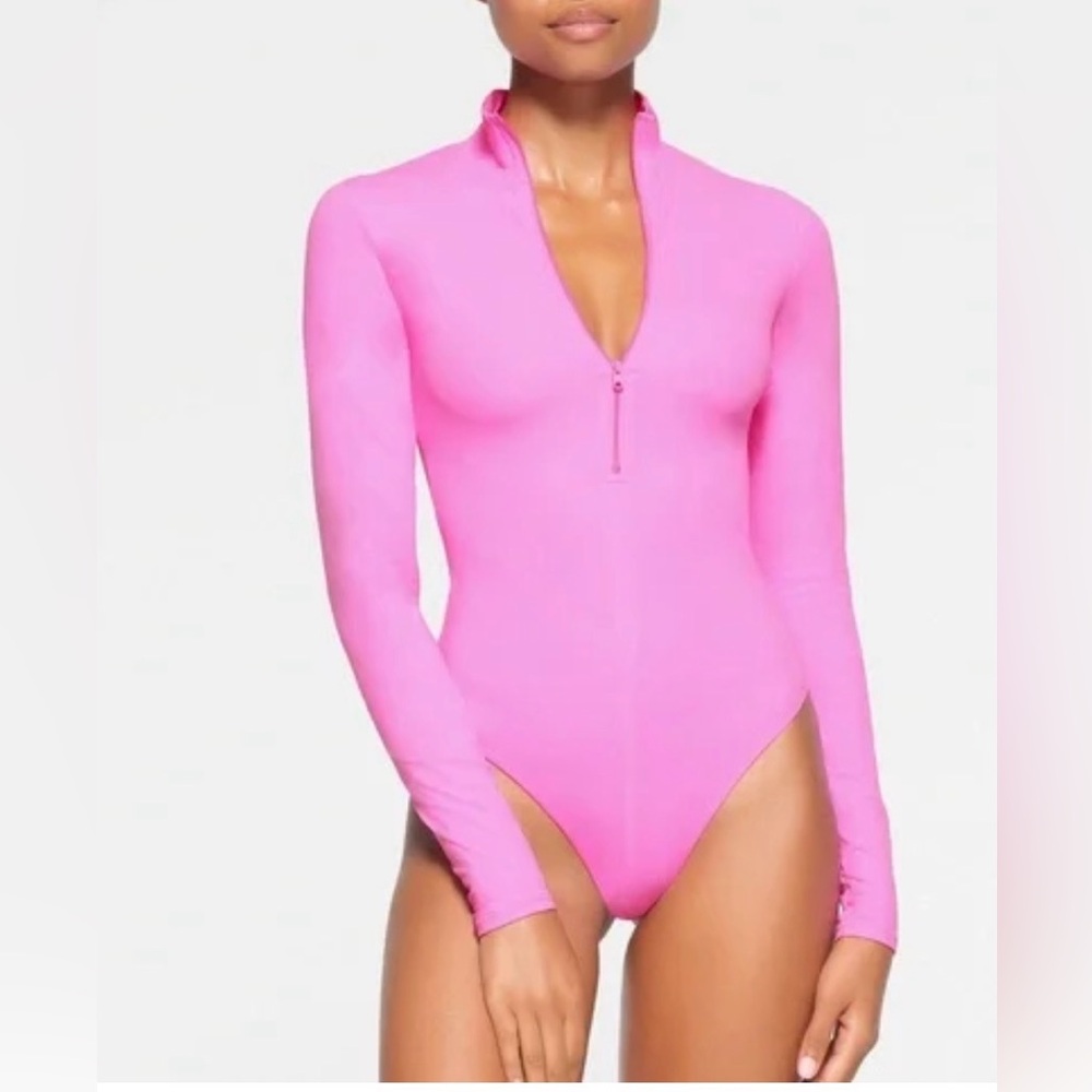 SKIMS Pink Long Sleeve Bodysuit